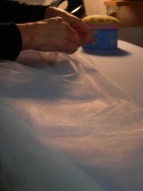 photo of my hands working with the fabric